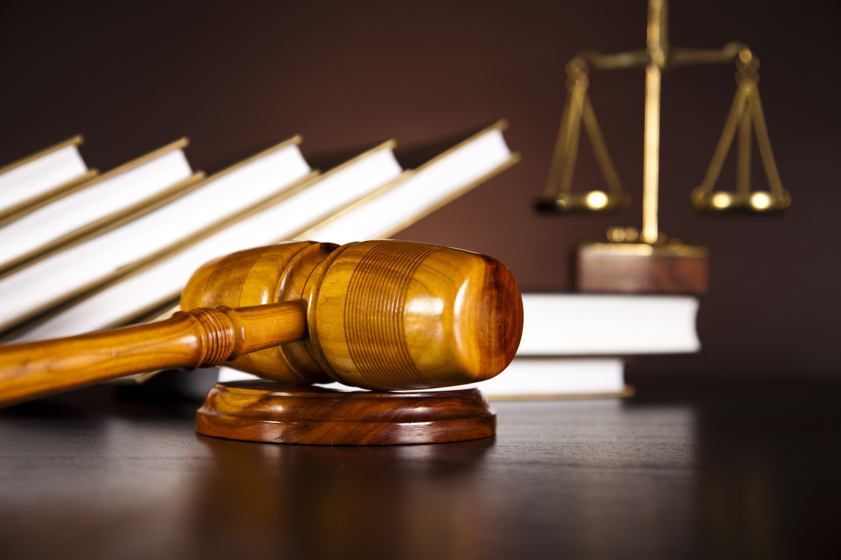  What is the process of taking legal action in the court of law? 